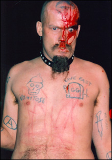 SCUM PUNK: Helmeted in blood, throwing poo-poo, starting riots, GG Allin took the frontman-as-health-hazard thing to the limit.